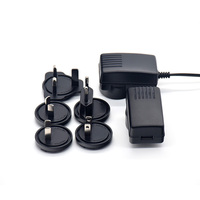 Chargeur de bureau interchangeable 12V 1.5A avec prise DC standard britannique, protection OVP/OTP/SCP, 18W CC-CV pour éclairage LED et usage médical