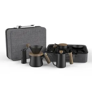 Juego de café de cerámica de lujo para Navidad, conjunto de tazas de porcelana blanca y negra, amoladora Manual, juego de café con gotero, 6 uds.