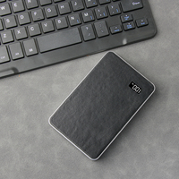 Batterie externe portable en cuir véritable ultra-mince avec affichage LED, chargement magnétique sans fil et filaire, double fonction de charge, vente en gros d'usine