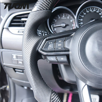 Volante de cuero perforado de fibra de carbono para Mazda Axela CX5, venta al por mayor de fábrica