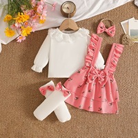 Ensemble bébé 2026 avec haut à col rond en dentelle à motif feuille + robe fleurie dos nu avec chaussettes