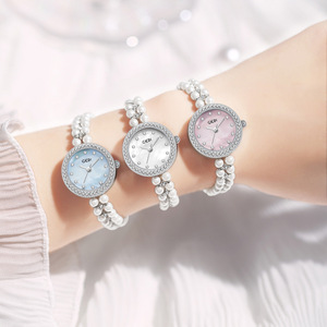Reloj de pulsera de cuarzo elegante para mujer, color oro rosa, pulsera de perlas, bisel de cristal, esfera negra - Product Image 2