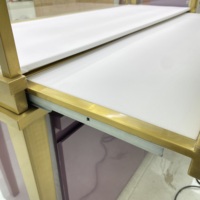 Ensemble de vitrines à bijoux HZD de luxe en fer/acier inoxydable plaqué titane avec éclairage LED pour bijouteries haut de gamme en centre commercial