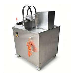 Máquina automática para cortar cocos, con corte continuo en la mitad y componente de motor central - Product Image 1