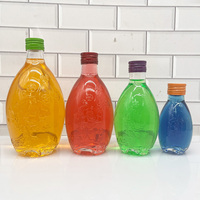 Bouteilles en verre élégantes de 250 ml, 330 ml et 500 ml avec logo en relief floral pour jus de fruits et boissons