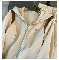 Costume pantalon deux pièces décontracté pour femme, uni, respirant, 100% polyester, fermeture éclair, manches longues, longueur midi, coupe régulière, à capuche, automne