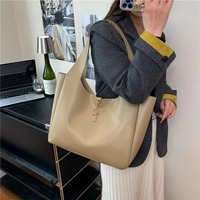 Sac à main seau vintage de créateur en cuir PU grande capacité pour femme avec serrure, idéal pour le shopping
