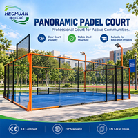 Terrain de padel panoramique extérieur Hechuan Orange Steel Framed avec éclairage LED à vue claire conforme à la norme EN 12150 pour projets éducatifs