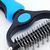 Brosse de toilettage double face en acier inoxydable écologique pour animaux de compagnie, éliminateur de poils, démêloir et peigne à sous-koir pour chiens - Vente en gros