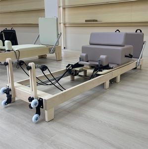 <span class=keywords><strong>Venta</strong></span> comercial de fábrica, conjunto de reformadores de marco de madera sólida importada, reformador plegable portátil, máquinas de Pilates plegables - Product Image 1