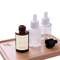 Flacon compte-gouttes cylindrique à épaule plate en verre ambré transparent ou dépoli de 1 oz (30 ml) pour sérum et huile essentielle