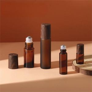 Chenlan hổ phách Kính <span class=keywords><strong>Roll</strong></span>-On chai với hạt gỗ nắp bơm lại cho các loại tinh dầu & chăm sóc da huyết thanh tùy chỉnh in ấn - Product Image 1