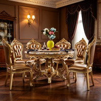 Ensemble de salle à manger rond en bois massif sculpté doré de style européen de luxe avec plateau en marbre naturel et chaises en cuir PU pour villa, maison, hôtel