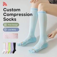 Chaussettes de compression graduée OEM ODM pour mollets, souples, élastiques, avec bord supérieur anti-roulement, idéales pour la gym, la corde à sauter, l'alpinisme et le quotidien