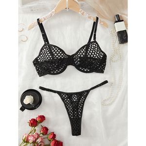 Прозрачный кружевной комплект женского белья из двух предметов: бюстгальтер и трусики - Product Image 1