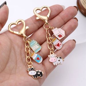 Nouveau porte-clés en alliage de zinc doré en forme de cœur pour animaux de compagnie, petit pendentif vache, accessoire de sac - Product Image 5
