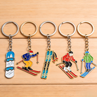 Porte-clés en métal personnalisé pour skieurs, fabrication OEM, logo personnalisé, alliage de zinc, porte-clés de snowboard et de ski pour cadeaux de sports d'hiver