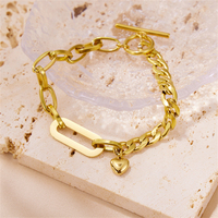Pulsera de Cadena Mixta Chapada en Oro Real de 18K con Eslabones Ovalados de Acero Inoxidable, Cadena Cubana y Dije de Corazón con Cierre T/O