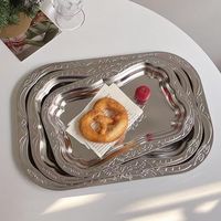 Moderne retro roestvrijstalen dinerborden, rechtstreeks van de fabriek, voor kantines en restaurants, met een gelukkig bloemenontwerp voor fruit- en snackborden.