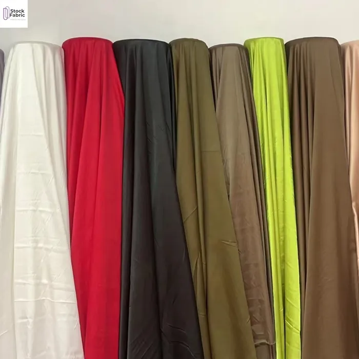 Popular China textile wholesale polyester plain silk satin fabric for sale solid color stock lots