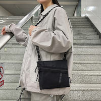 Nouveauté 2026 : Sac bandoulière style Harajuku pour femme et homme, design de niche, mini sac à main portable et tendance pour téléphone, en nylon imperméable