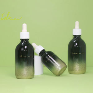 Bouteille compte-gouttes en verre de 50 ml avec tête de pompe à émulsion et impression à chaud dégradée bleue à paillettes, vente en gros sur mesure en usine - Product Image 4