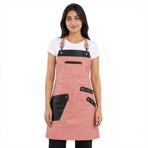 Tablier en cuir rose pour femme avec fermeture à bouton-pression, manches courtes, détection anti-aiguille, accents noirs, plusieurs poches, pour usage en restaurant et bar - Product Image 1