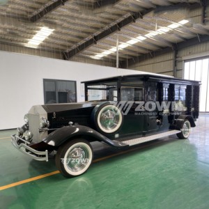 Auto Eléctrico Estilo Vintage con Parrilla Plateada y Faros Redondos, Carrocería Negra y Llantas con Banda Blanca - Product Image 3