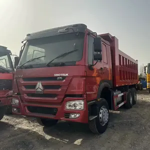 Camion à benne basculante SINOTRUK HOWO rouge 6*4 camion à benne basculante haute performance à dix roues d'occasion