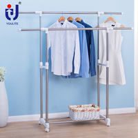 Porte-vêtements suspendu en métal à double niveau professionnel Standard cintre à double pôle rotatif conception détachable pour les salles de bain