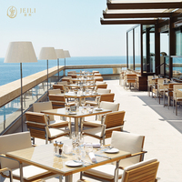 Ensemble de meubles de terrasse pour hôtel de bord de mer, style moderne, avec coussin de fauteuil en corde tressée JEILI, table en métal, pour restaurant commercial extérieur.