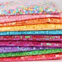 Vente en gros de petites paillettes en forme de marguerite de 9 mm pour vêtements, bijoux, jouets, remplissage de slime, gel cristallin, accessoires