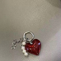 Porte-clés mousqueton en métal écologique avec grand cœur rouge perlé, design de niche, pendentif haut de gamme pour voiture et sac, accessoires tendance