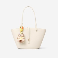 2025 nouvelle mode dames Litchi motif décontracté fourre-tout sac à main simple épaule fermeture éclair chaînes PU 20L lavage à la main en gros d'âge moyen