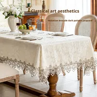 Nappe rectangulaire pour six personnes en fibre chimique soluble dans l'eau, motif floral et bordure en dentelle