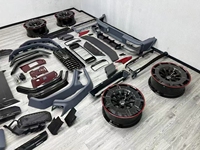 Kit carrosserie aérodynamique complet en fibre de carbone pour Mercedes G63 W464 SUV tout-terrain, comprenant des ailes larges, un capot BRABUS et un diffuseur arrière.