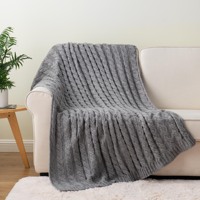 Couverture décorative en tricot torsadé gris chiné pour canapé et salon – Vente en gros