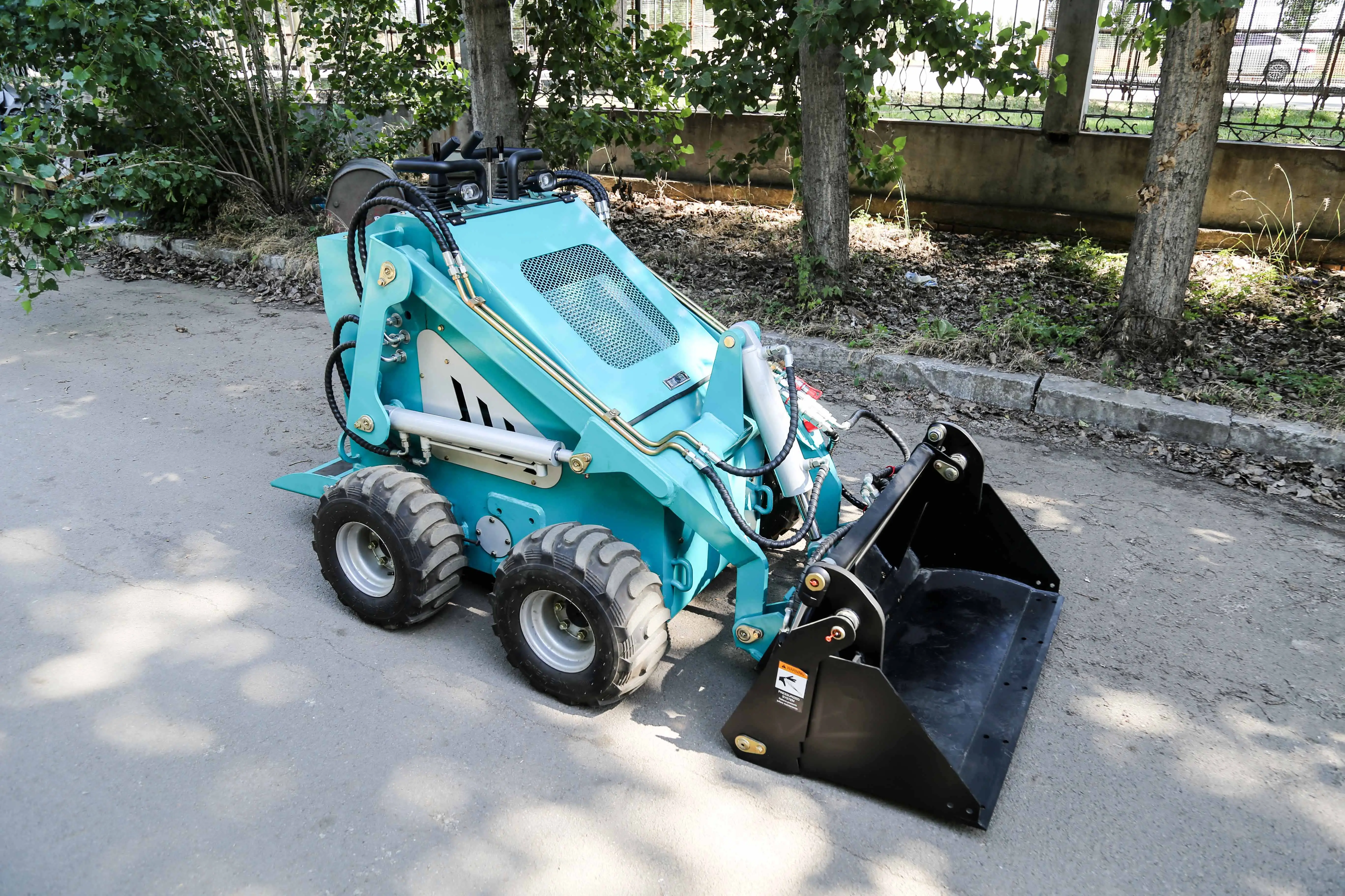 Spedizione gratuita EPA CE motore ruota cingolata Diesel mini skid steer track Loader Mini Skid Steer loader con binario