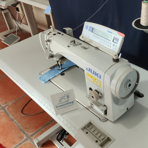 Machine à coudre japonaise d'occasion à entraînement direct DDL-9000B, coupe-fil automatique, 4500 points/min, épaisseur de couture 12mm, en promotion - Product Image 1