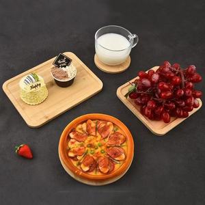 Plateau à pizza et à steak en bois massif de style japonais avec poignée en bois, planche à pizza ronde en bambou, plateau à pizza double face. - Product Image 1