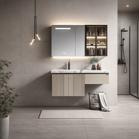 Meuble-lavabo mural gain de place aux proportions équilibrées, avec panneau cannelé et étagères ouvertes, en tons neutres