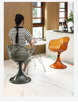 Chaise de salle à manger moderne en acrylique intégré transparent ambre, avec accoudoirs incurvés et dossier ergonomique, design coquille, pour la maison et le bureau
