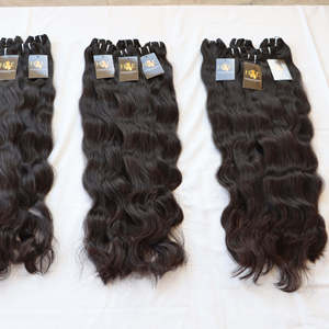 Extensions de cheveux ondulés bouclés, cuticules alignées, extensions de cheveux humains indiens non traités, ondulés bruts de vison, vente en gros - Product Image 1