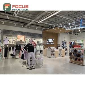Customized Retail Outlet Brushed Stainless Steel Glass Showcase Installation Service Franchise Clothing Store - Product Image 3
