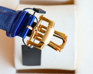 Montre mécanique automatique haut de gamme avec bracelet en cuir bleu, mouvement tourbillon, design artistique dragon. - Product Image 5