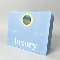 Sacs shopping en papier découpés sur mesure de luxe pour l'emballage de bijoux de mode
