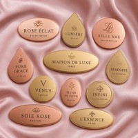 Étiquette de parfum personnalisée en métal moulé par injection électroplaqué, écologique, de luxe, en forme de goutte d'eau, décorative et étanche
