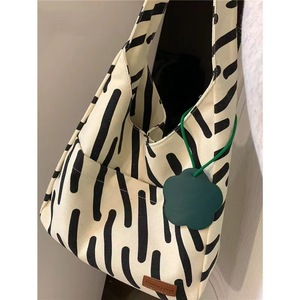 Gran oferta 2025, bolso de cuero PU tejido de moda de lujo para mujer, Mini Dumpling Jodie, bolso de hombro con tiras en blanco y negro, bolsos de mano - Product Image 2