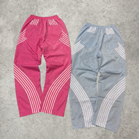 Pantalon de survêtement en nylon rayé surdimensionné Y2K Streetwear avec logo personnalisé OEM pour hommes, pantalon ample vintage à jambes larges, pantalon parachute