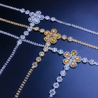 FanYue Chaîne de corps sexy plaquée or pour femme, bijoux de lingerie avec strass fleur jaune, chaîne de string, chaîne de taille T-back